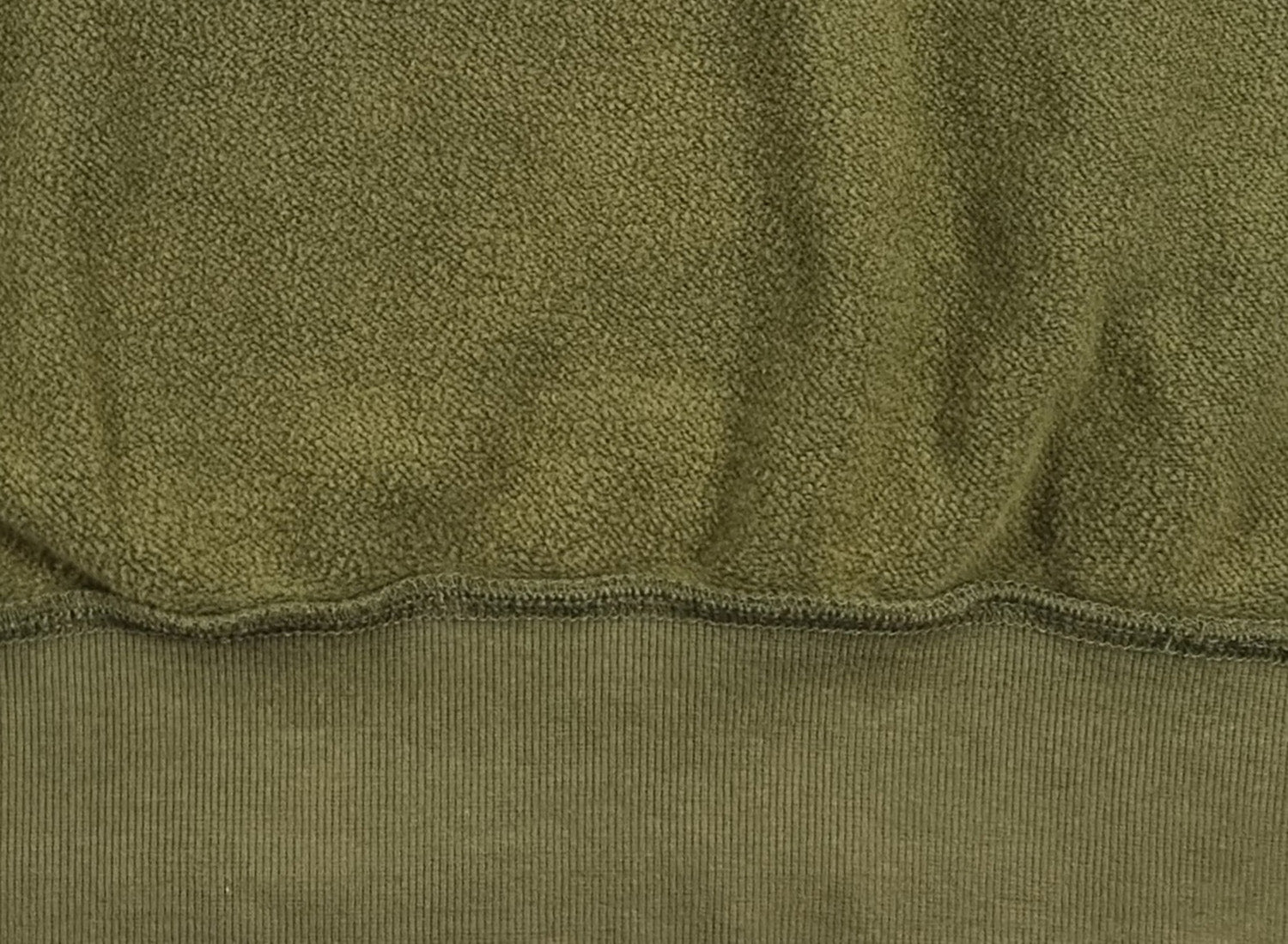 Faded, dry green sweatshirt